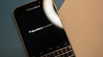 black and silver blackberry qwerty phone