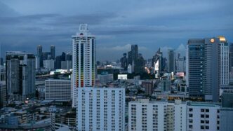 a view of a city with tall buildings