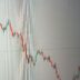 Stock market chart shows a downward trend.