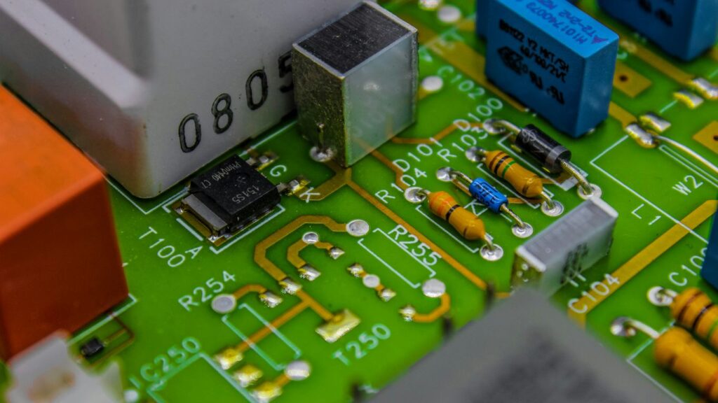 a close up of a circuit board with electronic components
