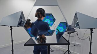 a man standing in front of a mirror in a room