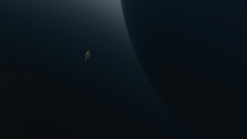 a person standing in the middle of a dark room