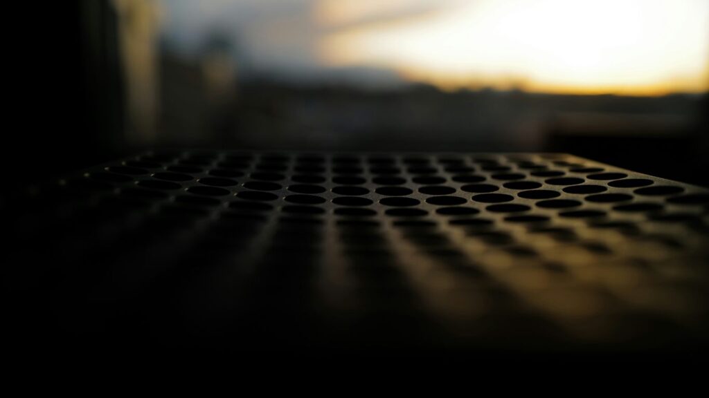black metal fence under blue sky during daytime