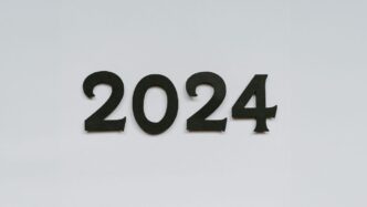 a white wall with a black number on it