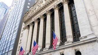 New york stock exchange building with american flags.