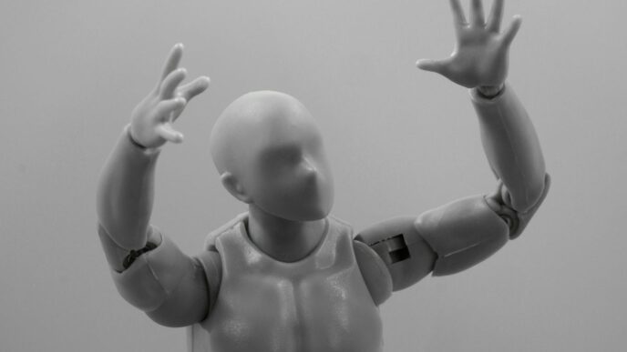 baby in white diaper lying on white textile