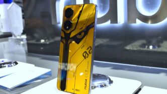 Yellow smartphone with futuristic design and camera lenses