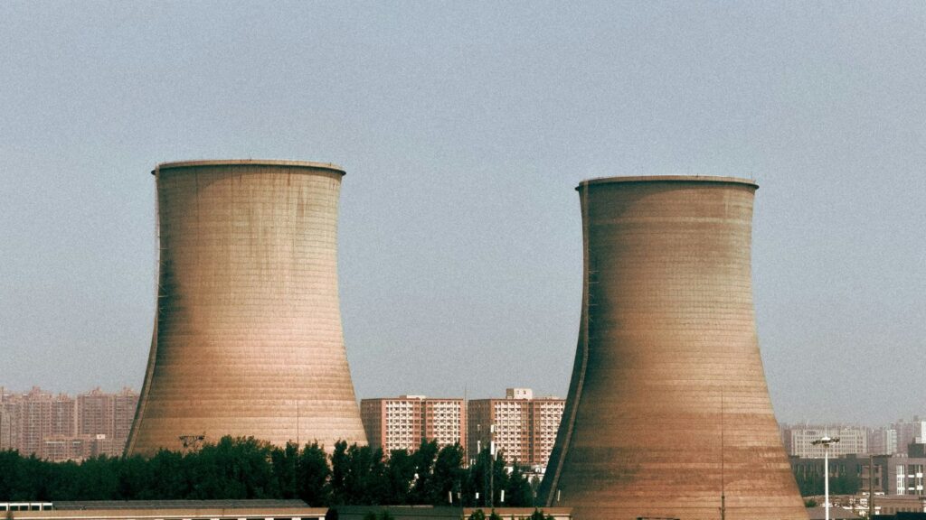 Cooling towers of a power plant are depicted.