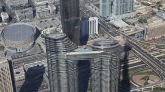 a view of a city from the top of a skyscraper
