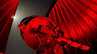 Telescope dome with red lights and moon visible moon
