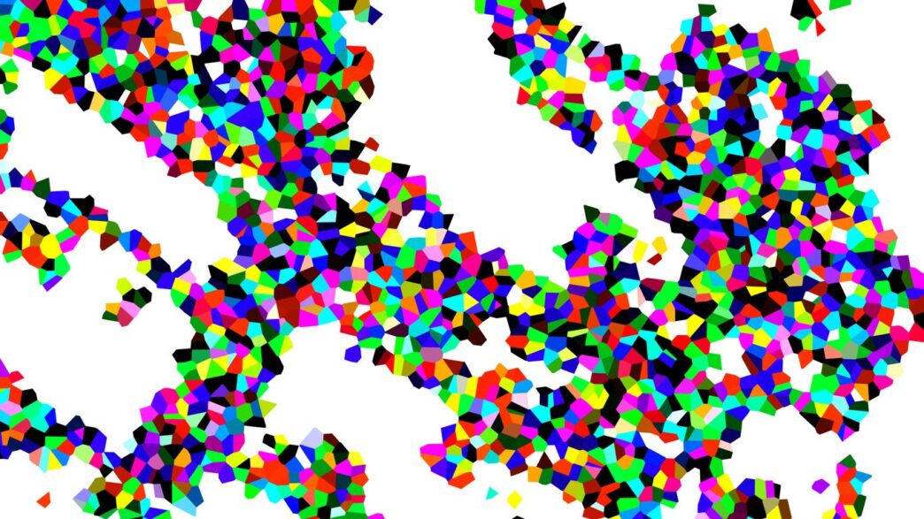 Abstract pattern of colorful fragmented shapes on white background