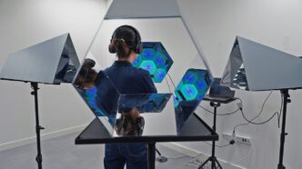 a man standing in front of a mirror in a room