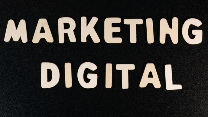 the words marketing and digital written on a black surface