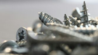 a bunch of screws that are laying on a table