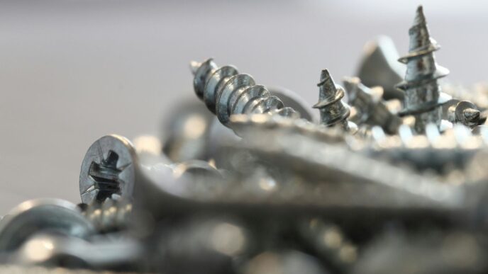 a bunch of screws that are laying on a table