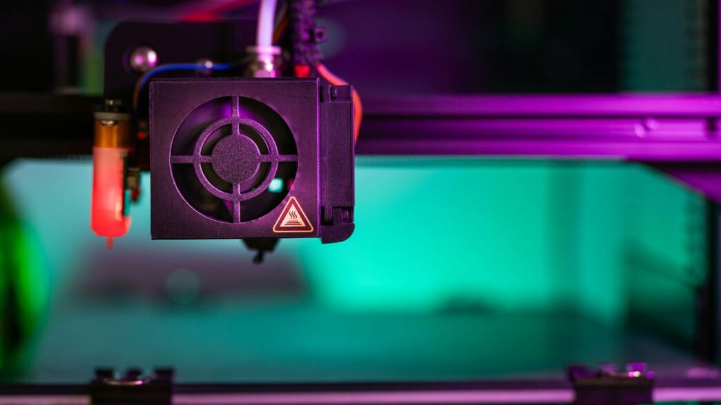 a close up of a machine with a purple light