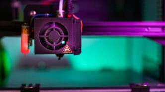 a close up of a machine with a purple light