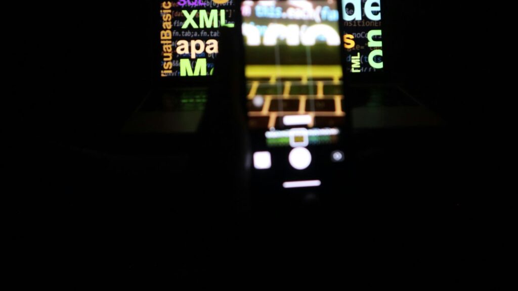 a cell phone is lit up in the dark