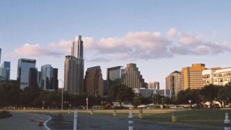 city buildings under blue sky during daytime