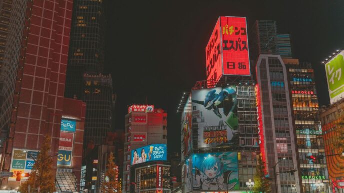 Vibrant cityscape with illuminated buildings at night