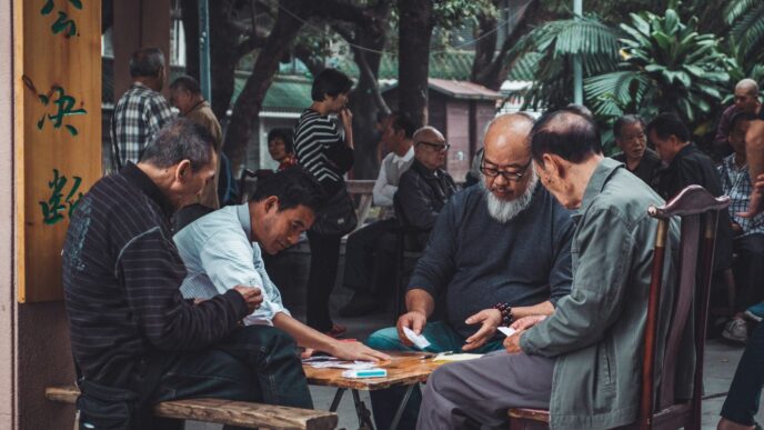group of man playing cards