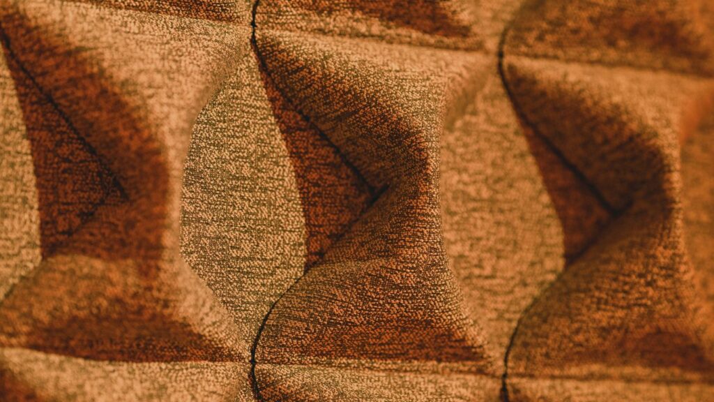 a close up of a wall with a pattern on it