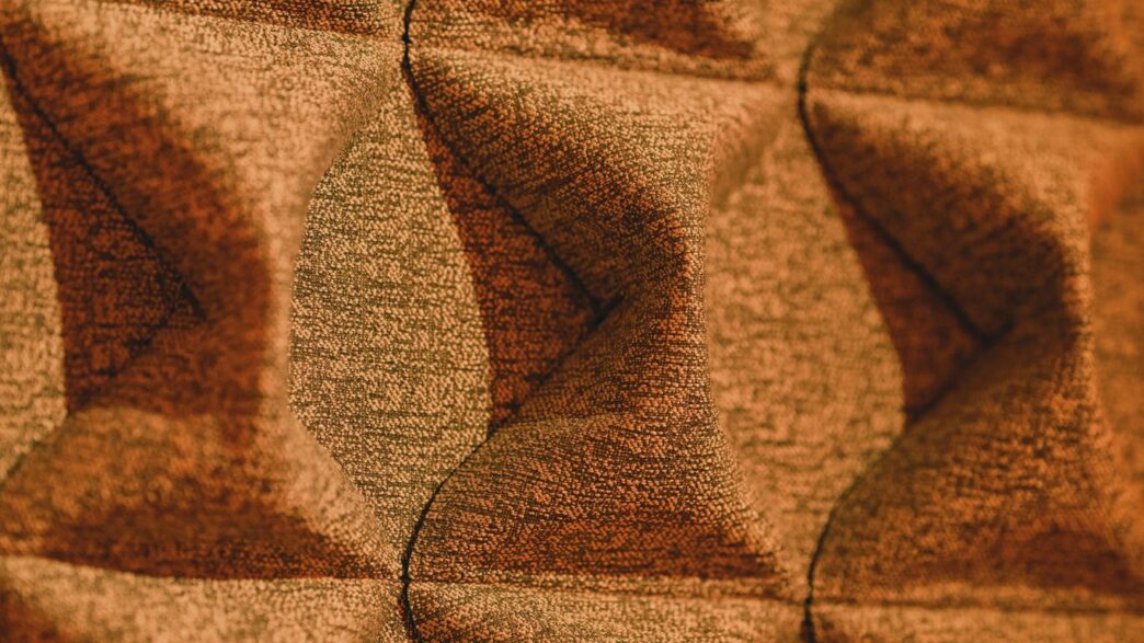 a close up of a wall with a pattern on it