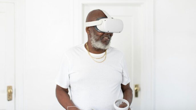 a man wearing a white robe and holding a cup