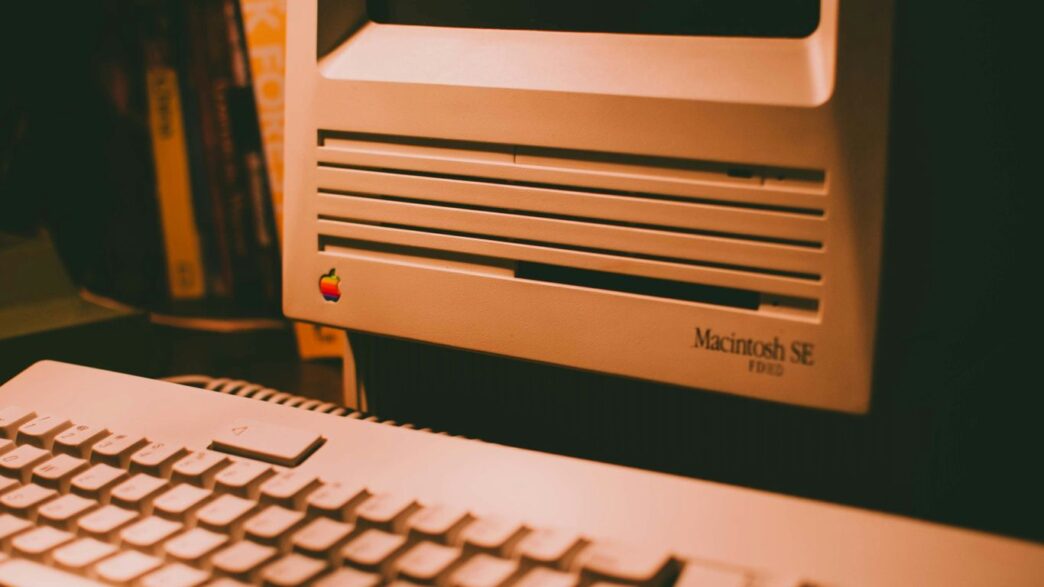 white computer keyboard on black table