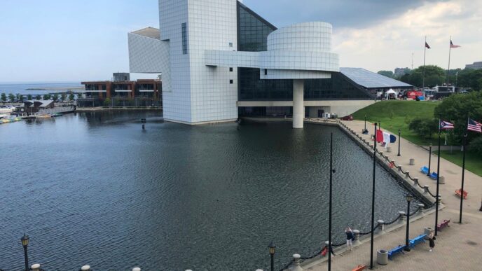 white concrete building near body of water during daytime
