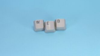 Keyboard keys spell out the word "web."