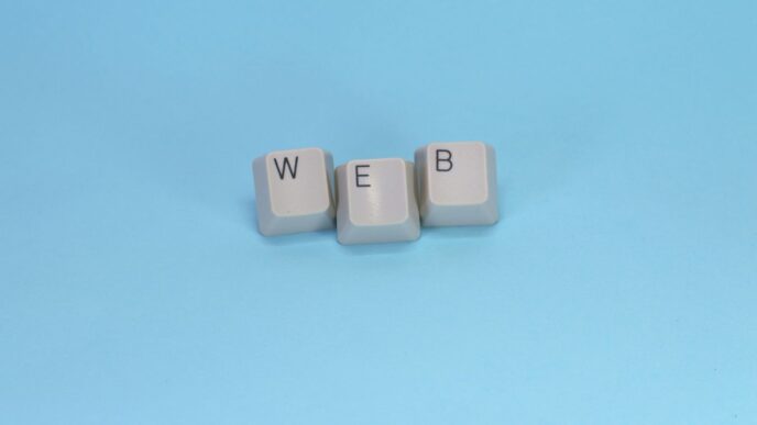 Keyboard keys spell out the word "web."