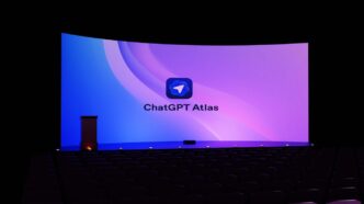 Large curved screen displays "chatgpt atlas" logo.