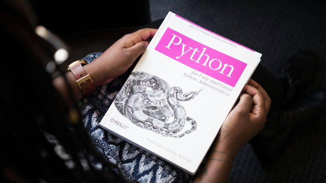 shallow focus photo of Python book