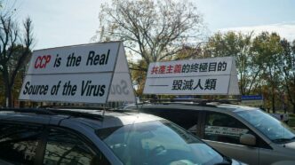 black car with white and blue signage