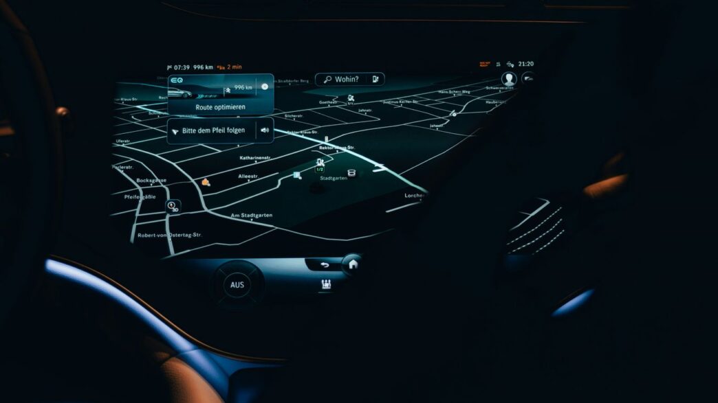 the dashboard of a car with a map on it