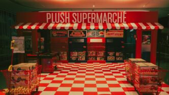 Plush supermarché storefront with checkered floor