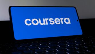 Coursera logo displayed on a smartphone screen.