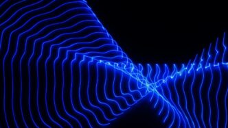 a blue wave of light in the dark