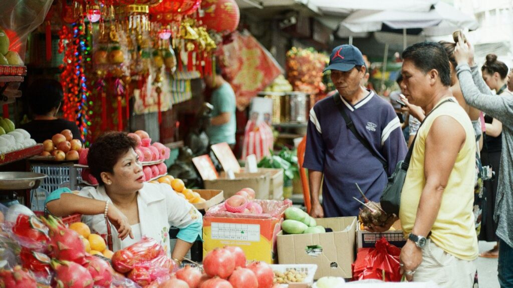 man standing in front of woman