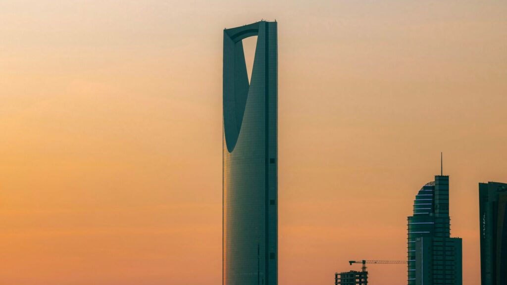 a very tall building in the middle of a city