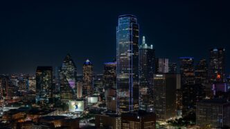 A view of a city at night from the top of a building
