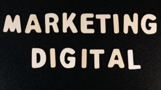 the words marketing and digital written on a black surface