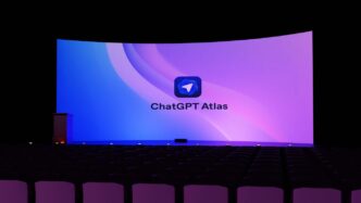 A large screen displays "chatgpt atlas" logo.
