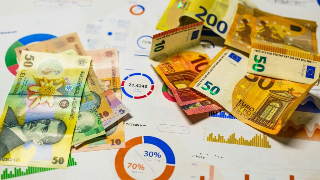 A bunch of money sitting on top of a table