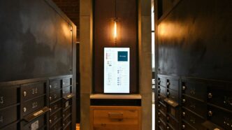 brown wooden cabinet with white printer paper