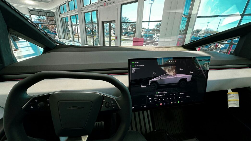 a car dashboard with a laptop on it