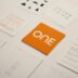 Orange card with "one" logo surrounded by other cards