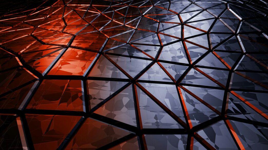 An abstract photo of a building with red lights