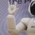 Asimo robot doing handsign